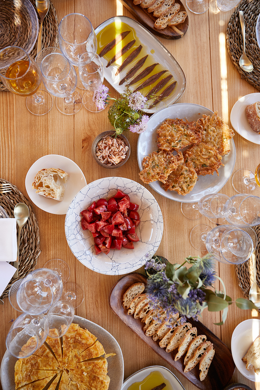 Image of a table in a typical andalusian restaurant with the typical food of southern Spain.