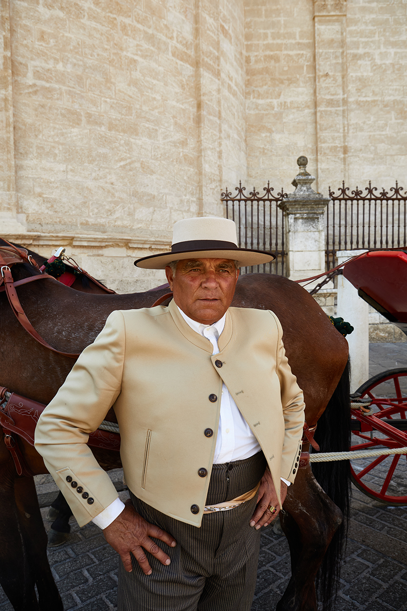 Man dressed in a typical Sevillian costume during the Roads & Kingdoms trip through Andalucia.