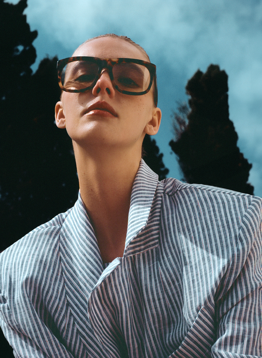 Model wearing sunglasses from the new campaign of The label edition.