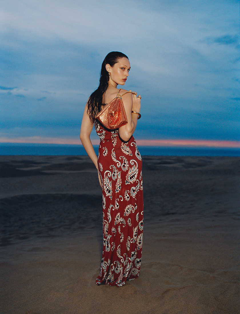 Image before sunrise with a model in a Harvey Nichols dress.