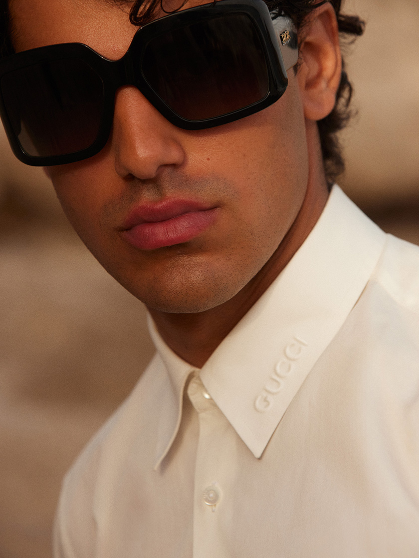 Model looking at the camera with big sunglasses for Vogue Arabia magazine