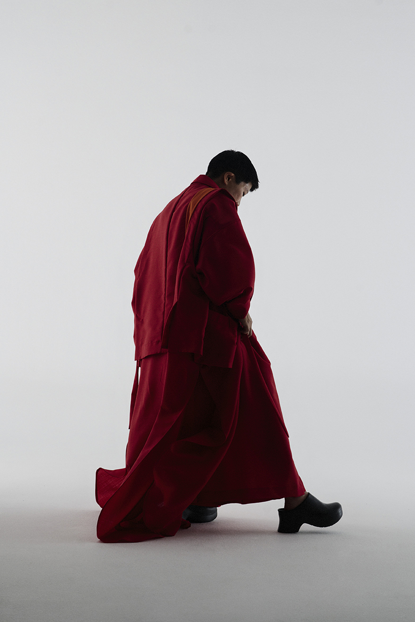 Sophia Wang co-founder of Mycoworks in a red suit. 